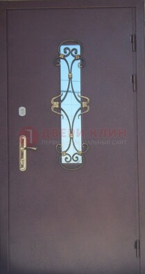 Металлическая дверь со стеклом и ковкой ДСК-77 в Белгороде